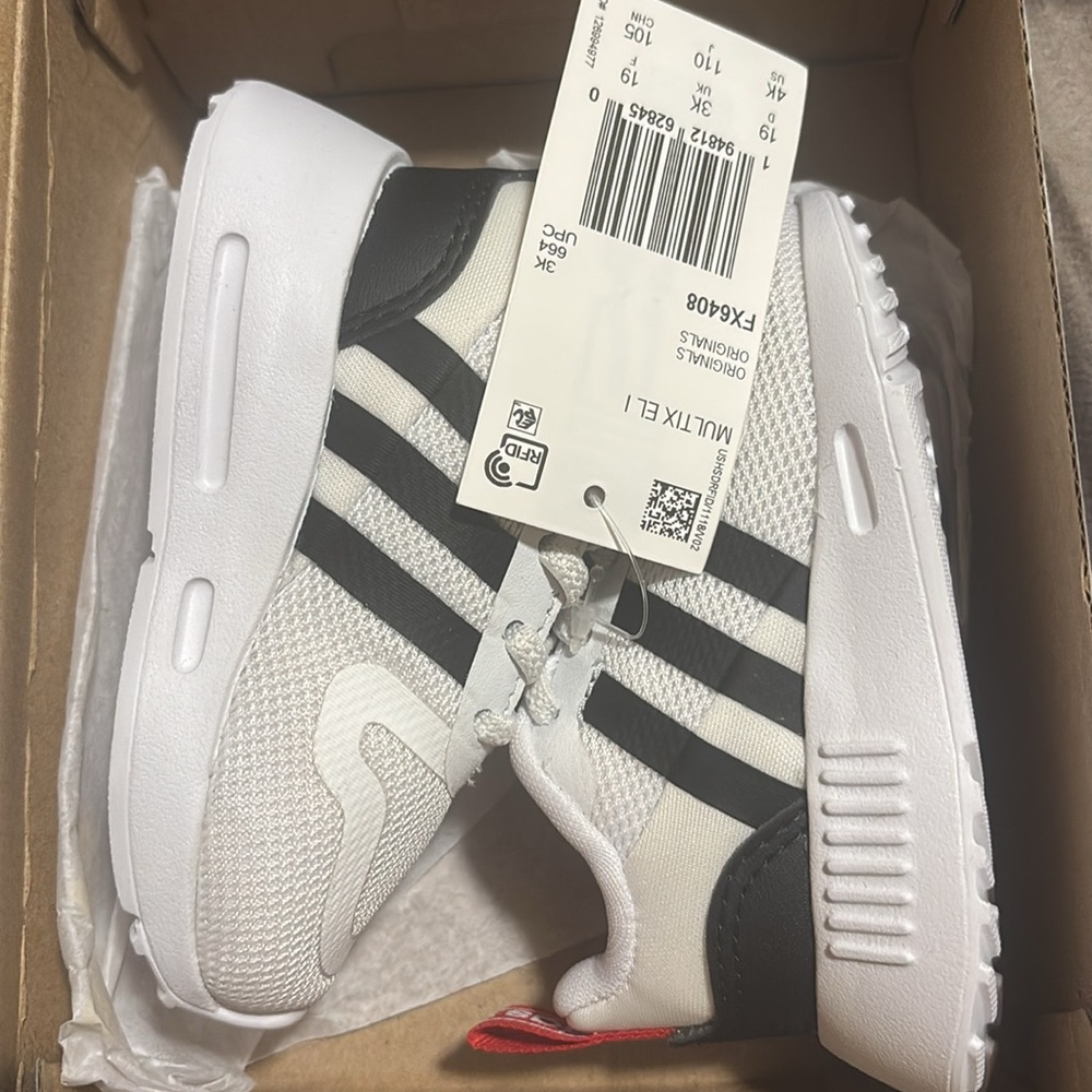 Adidas toddler shoes size 4